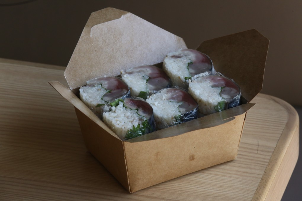 Saba bonzushi – thick pieces of mackerel pressed onto vinegared rice – for takeaway at Nikushou, a Japanese grilled meat restaurant in Hong Kong. Photo: Jonathan Wong