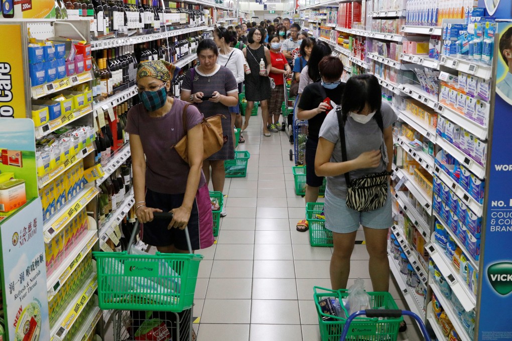 Singapore’s supermarkets have become the preferred place to shop after the government imposed a partial lockdown to contain the coronavirus pandemic. Photo: Reuters