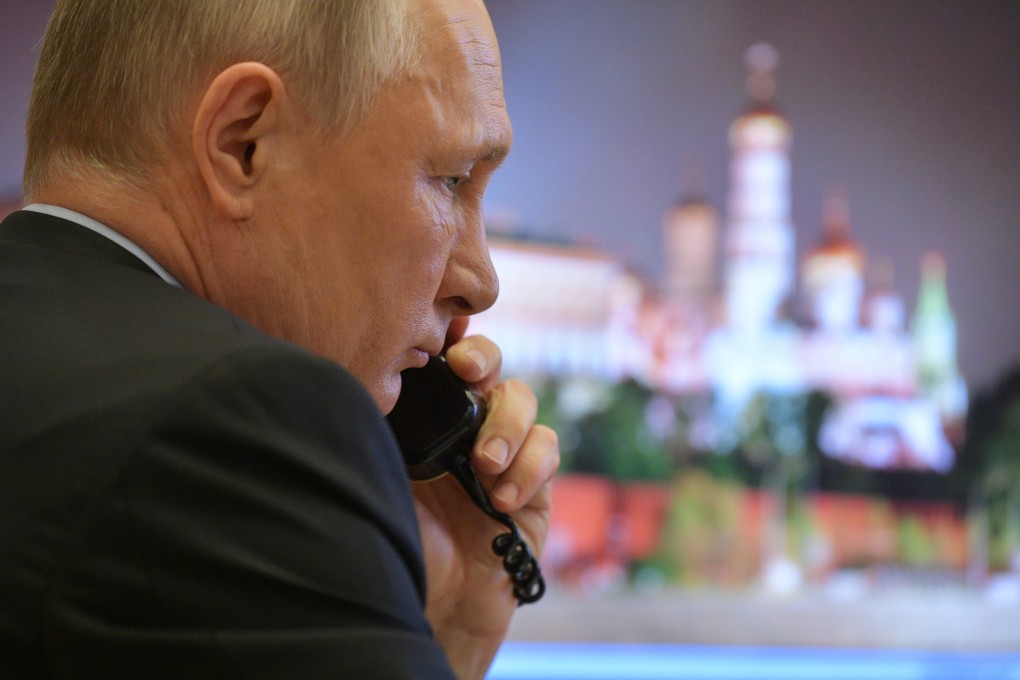 President Vladimir Putin takes part in a meeting on the Covid-19 situation, via a teleconference call at Novo-Ogaryovo state residence, outside Moscow, Russia,. Photo: EPA