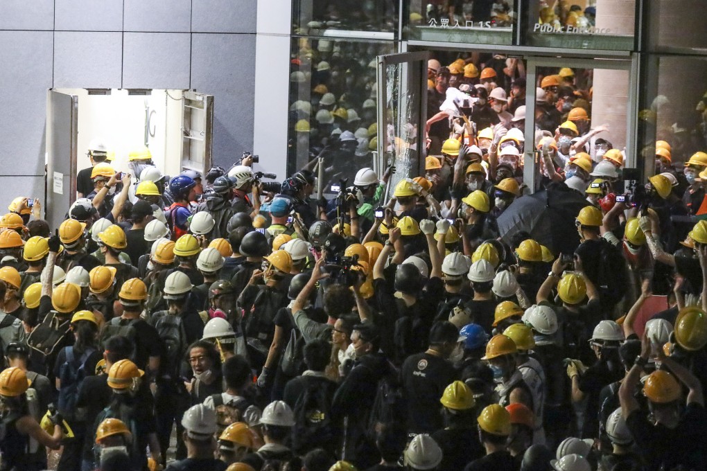Protesters storm the Legislative Council Chamber in Tamar after a march against the extradition bill on July 1, 2019. Photo: Dickson Lee