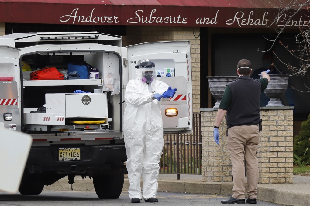 Paramedics and health care officials are seen outside the Andover Subacute and Rehab Centre in New Jersey on Thursday. Photo: Reuters