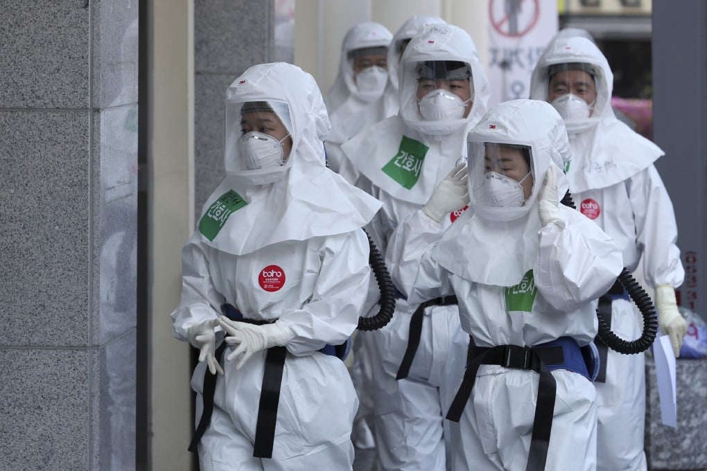 Health care workers arrive for duty at Dongsan Medical Centre in Daegu, South Korea. The city has seen a number of cases of recovered coronavirus patients testing positive again. Photo: AP