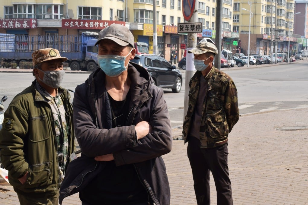 Daily-wage workers this week in Suifenhe, a Chinese city bordering Russia. Photo: Reuters
