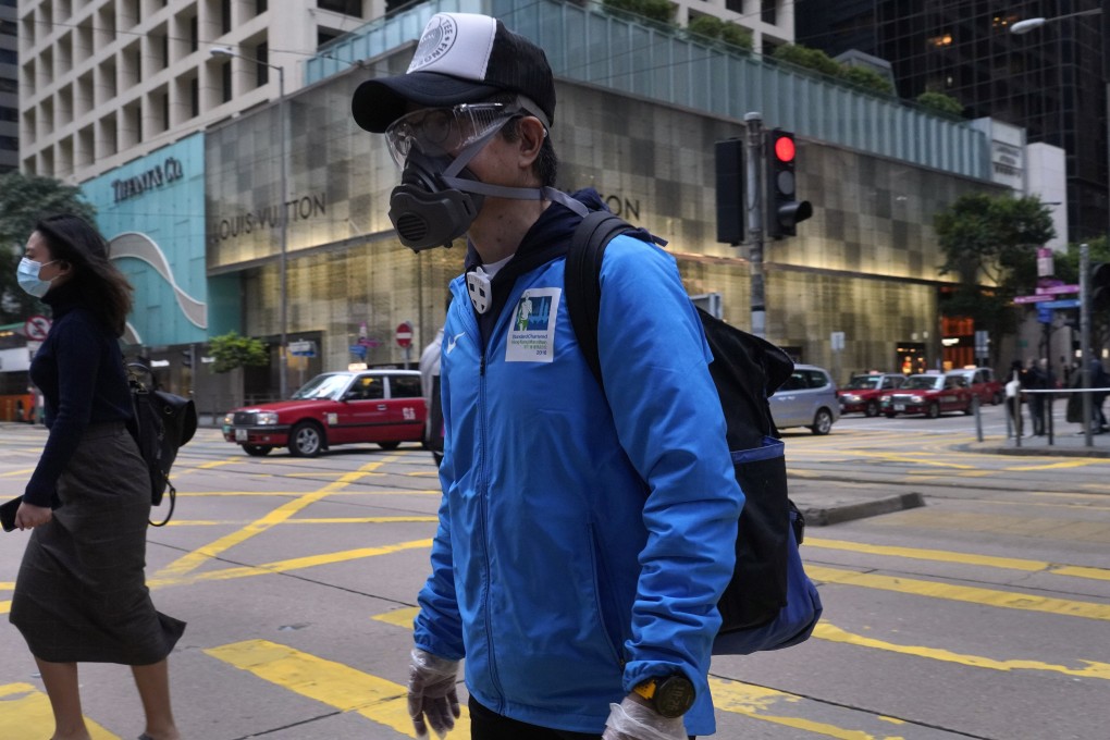 Hong Kong registered four new Covid-19 cases on Friday, the sixth straight day with a single-digit increase. Photo: AP