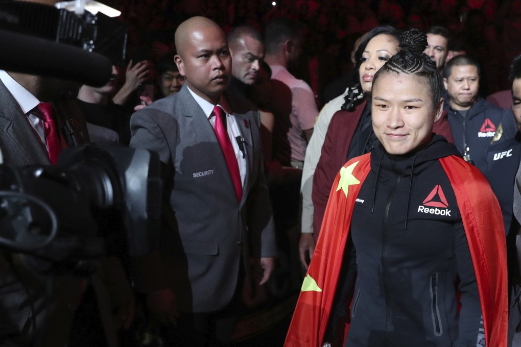 UFC women’s strawweight champion Zhang Weili makes her way to the Octagon for her title defence against Joanna Jedrzejczyk at UFC 248. Photo: AP