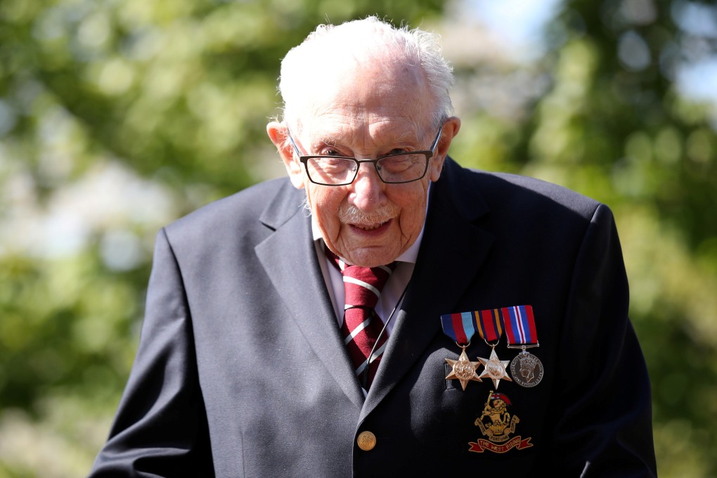 Retired British Army Captain Tom Moore, 99, has raised millions of pounds for health workers by walking around his garden 100 times before his 100th birthday. Photo: Reuters