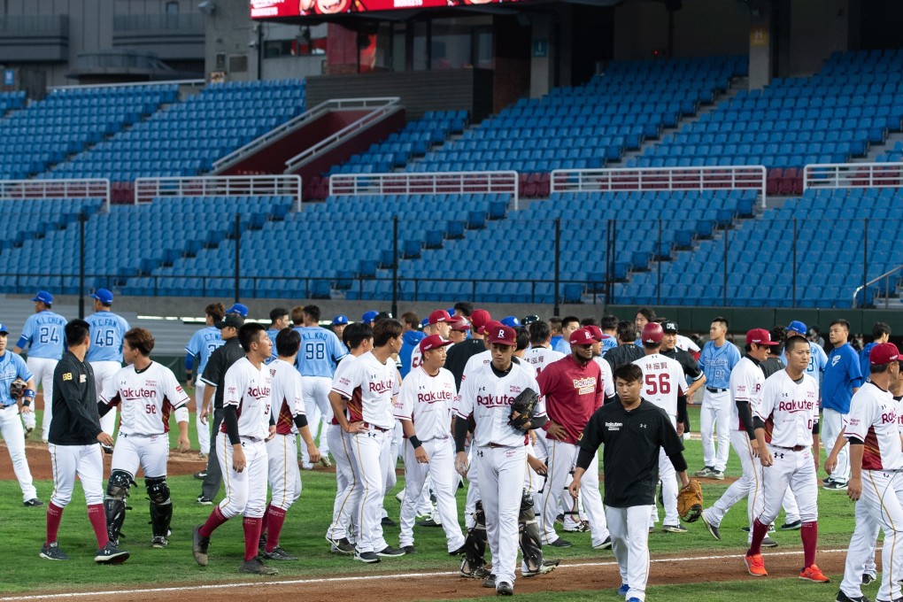 Players from the Fubon Guardians and Rakuten Monkeys disperse after a bench-clearing brawl during the first game of the season. Photo: Gene Wang/Getty Images