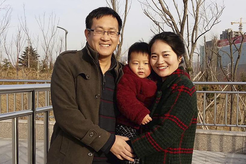 Wang Quanzhang and his wife, Li Wenzu, with their son in February 2015. He was arrested five months later and is now detained in Jinan, Shandong province, unable to join his family in Beijing. Photo: Wang Quanxiu via AP