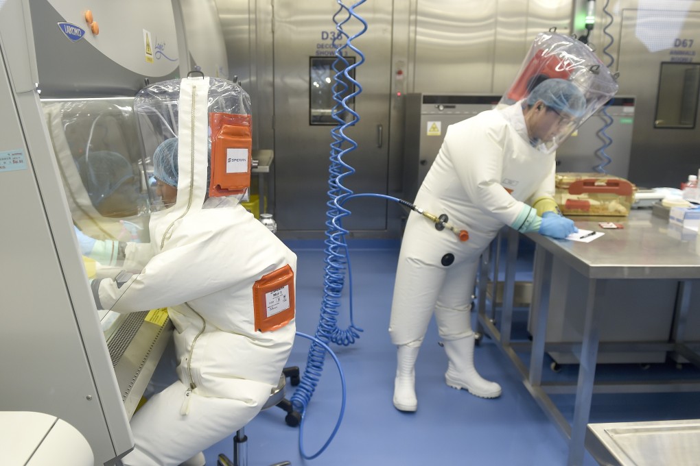 Researchers work in a lab of Wuhan Institute of Virology (WIV) in Wuhan, Hubei province. Photo: EPA-EFE