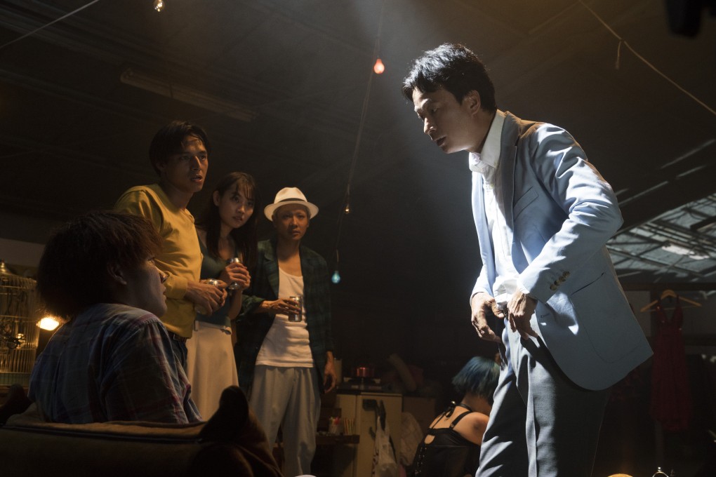 Kippei Shiina (right) plays a charismatic con artist in The Forest of Love, streaming on Netflix.