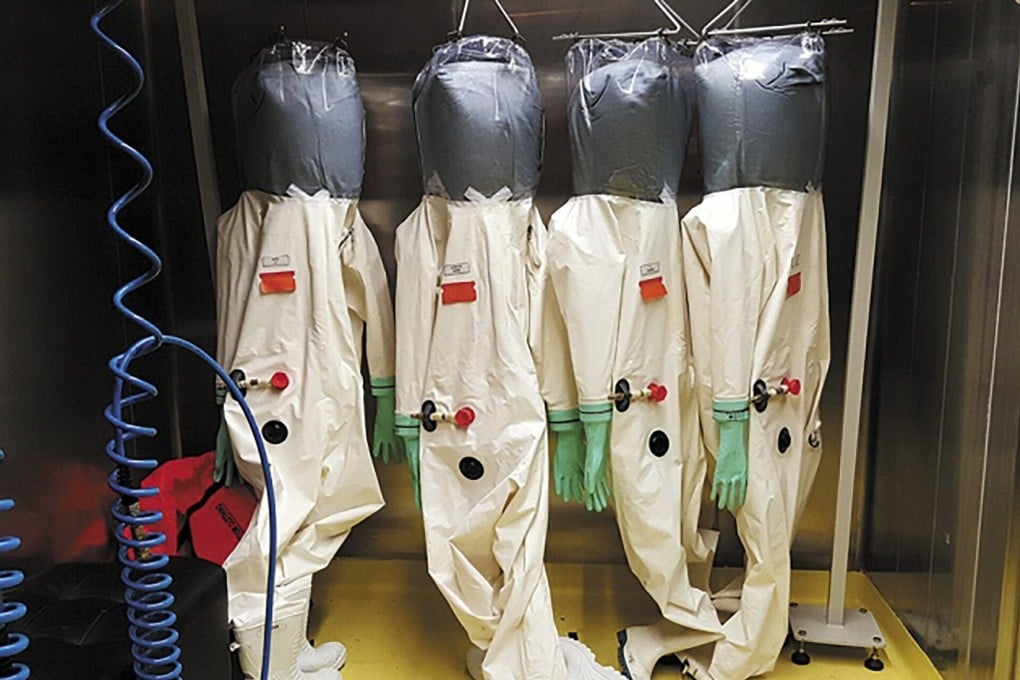 Hazard suits hang at the National Bio-safety Laboratory, Wuhan, the first lab on the Chinese mainland equipped for the highest level of biocontainment. Photo: Handout