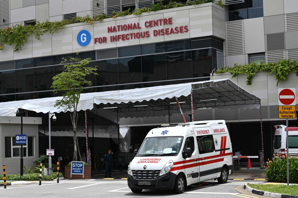 An ambulance leaves Singapore’s National Centre for Infectious Diseases, where coronavirus patients are being cared for. Photo: Roslan Rahman/AFP