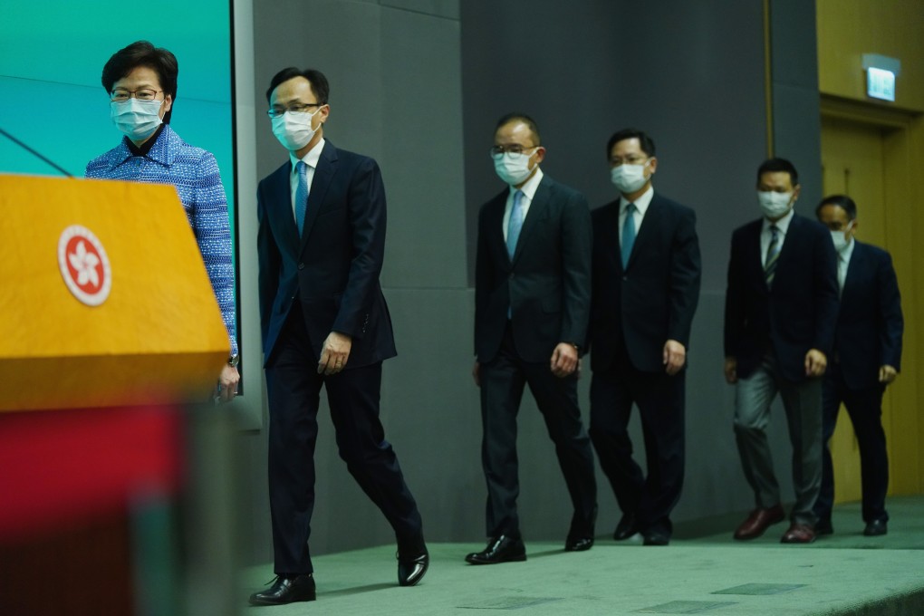 Chief Executive Carrie Lam leads out the new appointees. Photo: Sam Tsang