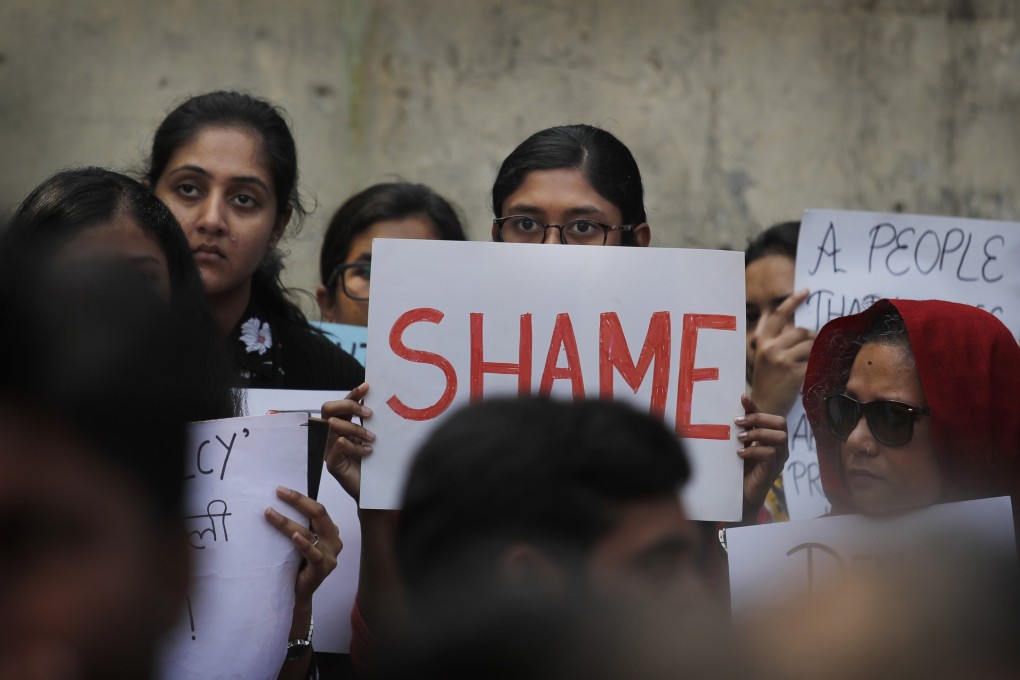 Students hold banners and participate in a protest against India’s citizenship law and recent communal violence in New Delhi, India, Tuesday, March 3, 2020. (AP Photo/Manish Swarup)