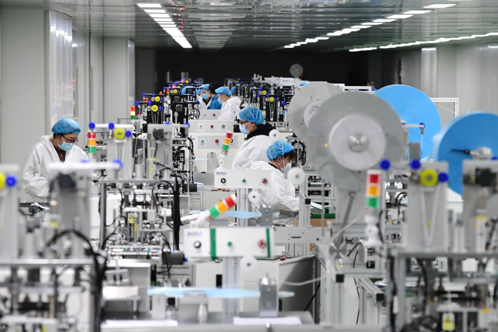 Workers at a medical mask production centre in Tangshan, Hebei, on March 30. Photo: Xinhua