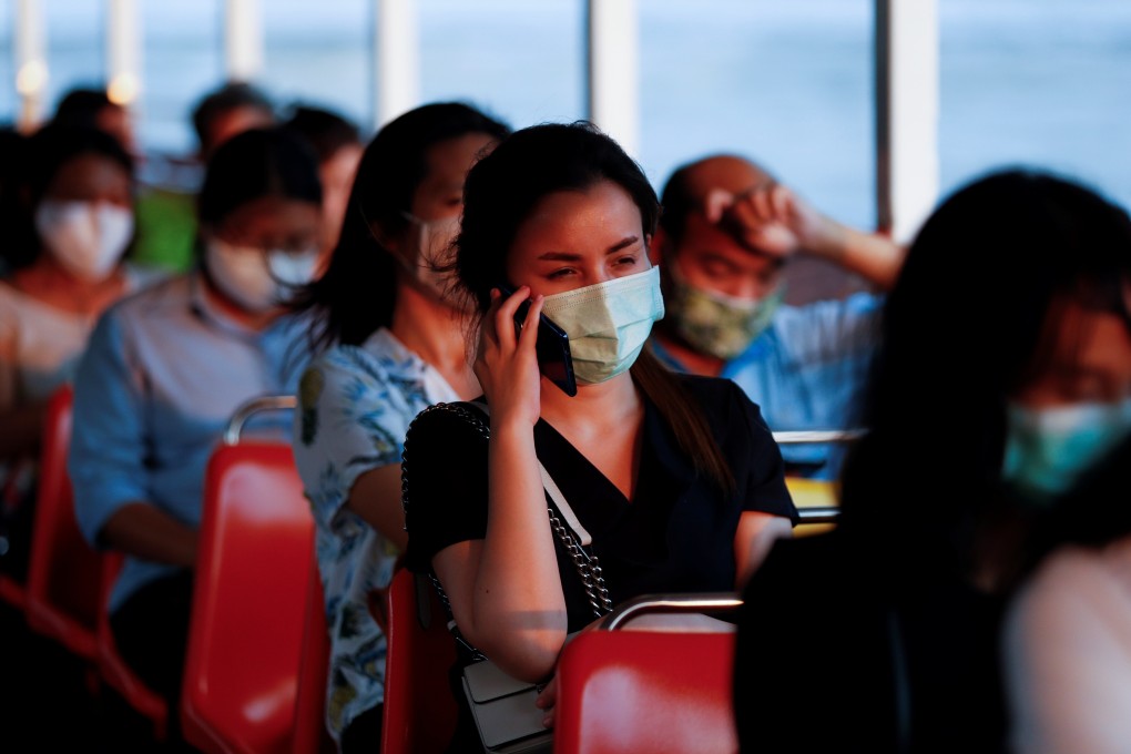 Commuters on a boat seen in face masks in Bangkok on April 15, 2020. Photo: Reuters