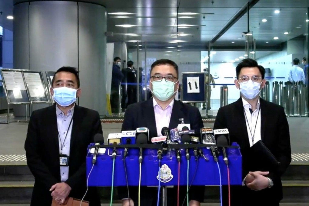 Senior Superintendent Steve Li (centre) and colleagues reveal details of the police investigation. Photo: Handout
