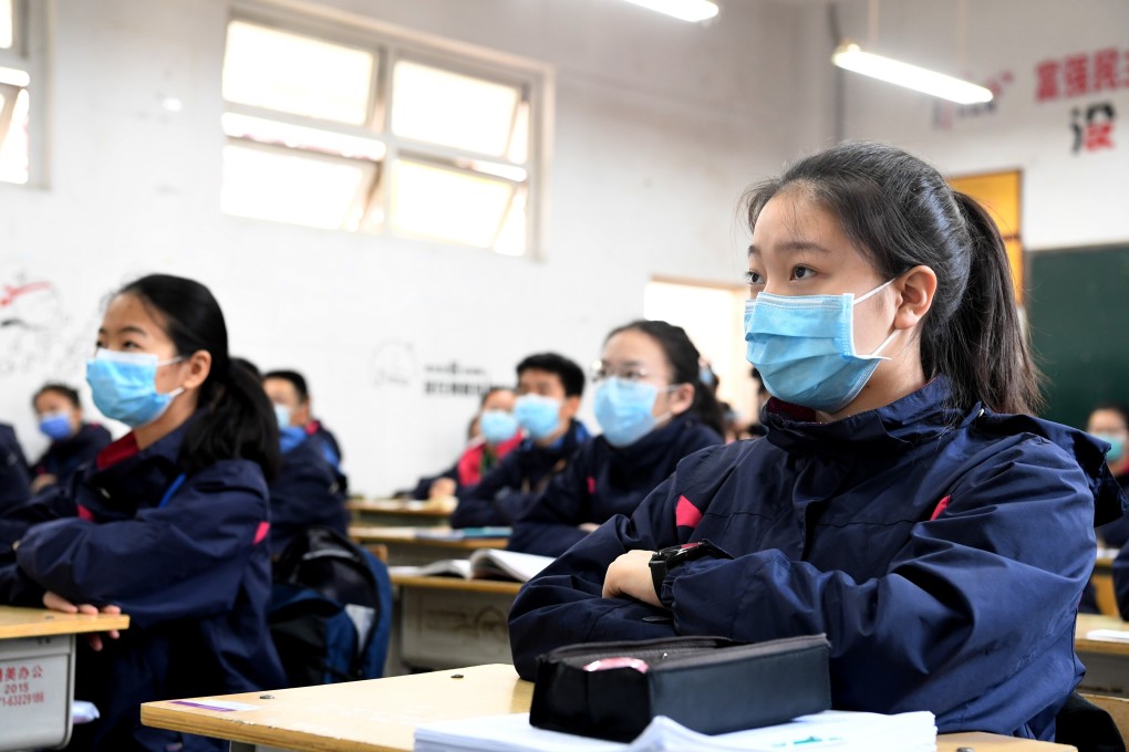 Students returned to class at a middle school last week in Zhengzhou, Henan province. Many schools have reopened in the past two weeks. Photo: Xinhua