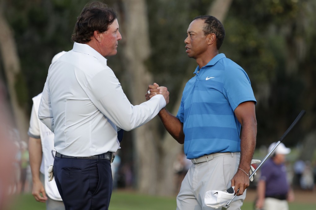 Phil Mickelson and Tiger Woods will renew their rivalry in a pay-per-view match in May. Photo: AP