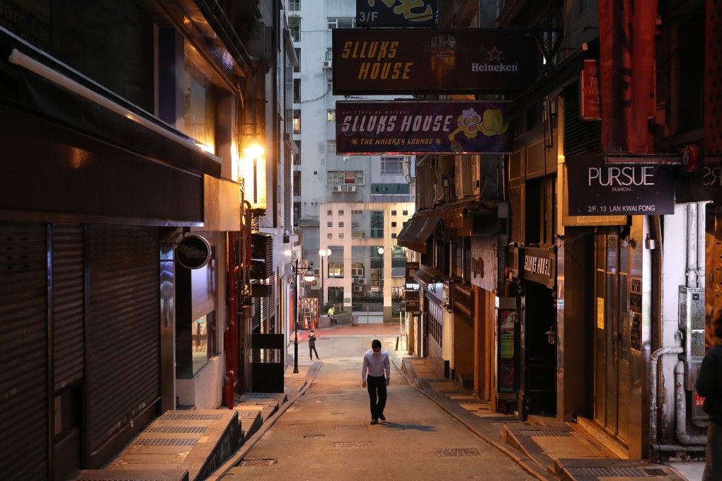 The normally busy nightlife area of Lan Kwai Fong in Central has been much quieter after bars and pubs were ordered to close by the government as part of its social-distancing measures. Photo: Winson Wong