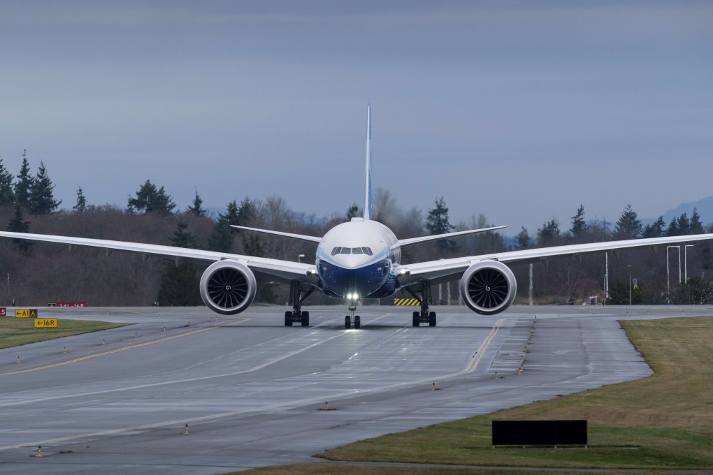 A Boeing 777X airliner taxis alongside the runway in preparation for its first flight on January 25, 2020, in Everett, Washington. Cathay Pacific has ordered 21 of the new long-haul jets, though sources say they are now considering deferring delivery or even switching to a less expensive plane. Photo: Getty Images