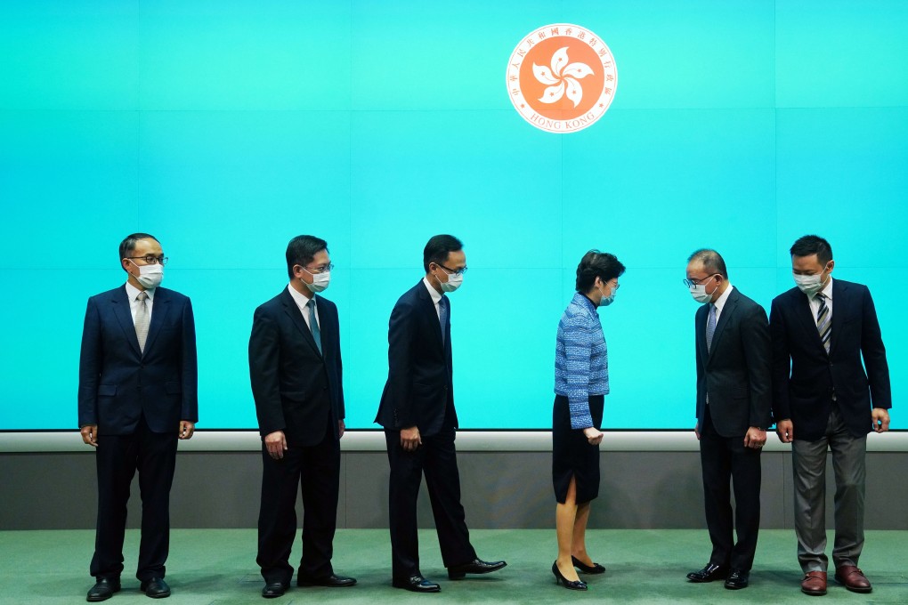 From the left, Secretary for Financial Services Christopher Hui, Secretary for Innovation Alfred Sit, Secretary for the Civil Service Patrick Nip, Chief Executive Carrie Lam, Secretary for Constitutional and Mainland Affairs Eric Tsang, and Secretary for Home Affairs Caspar Tsui meet the press at Tamar on April 22. Photo: Sam Tsang