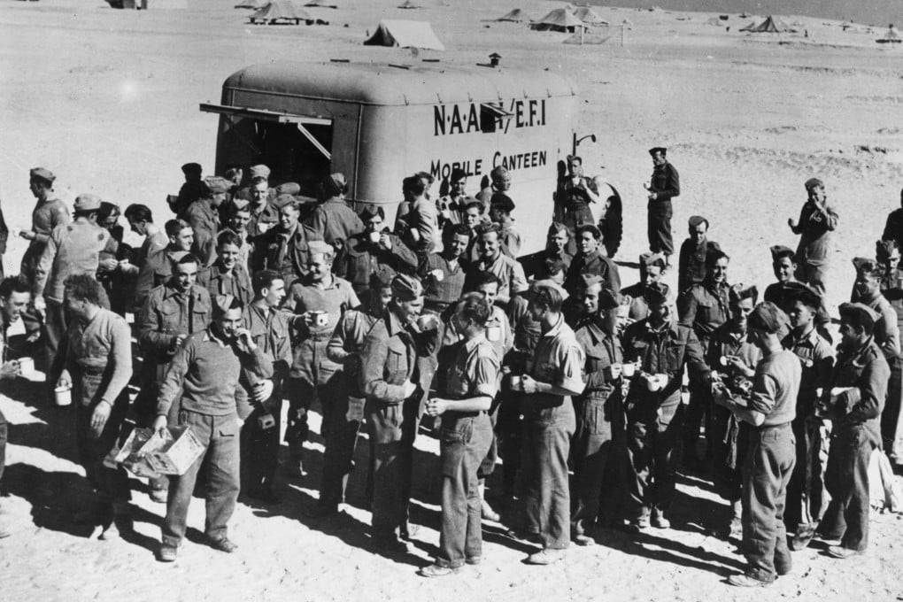A Naafi mobile canteen brings a variety of goodies from home for British soldiers in Libya in 1942. Photo: Getty Images