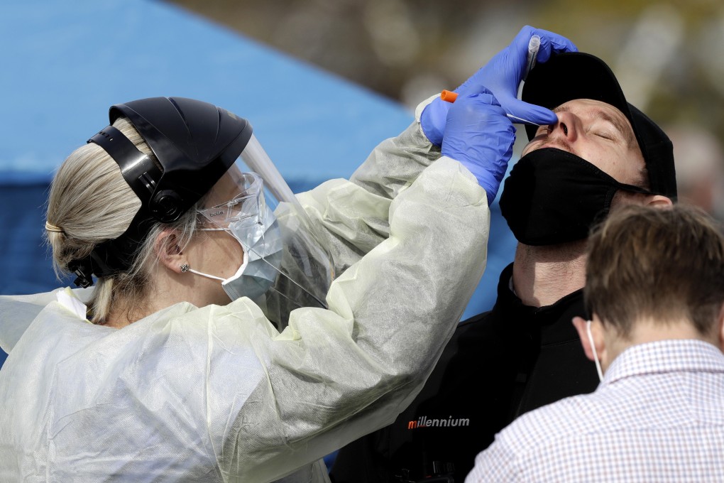 Medical staff administer pop-up coronavirus tests in New Zealand. Photo: AP