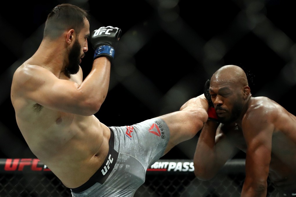 UFC heavyweight contender Dominick Reyes kicks champion Jon Jones in their light-heavyweight title bout at UFC 247 in February. Photo: AFP