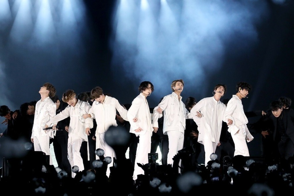 BTS perform on stage in Saudi Arabia. Korean entertainment companies have been left reeling by the coronavirus pandemic, as concerts and world tours by K-pop groups are cancelled. Photo: DPA