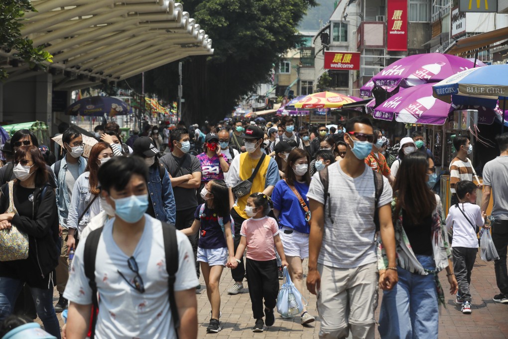 People wear masks as they visit Cheung Chau in Hong Kong at the weekend. Photo: Winson Wong