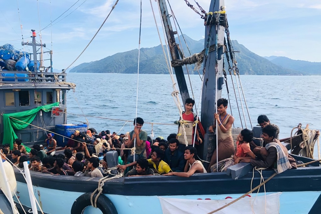 A wooden boat carries suspected Rohingya migrants detained in Malaysian territorial waters off the island of Langkawi. Photo: AP