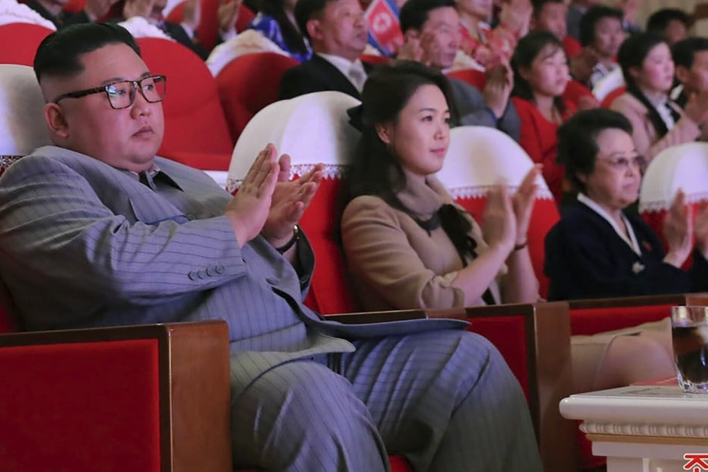 North Korean leader Kim Jong-un, left, pictured with his wife Ri Sol-ju, centre, and aunt Kim Kyong-hui, third from left, in January. Photo: KCNA via AP