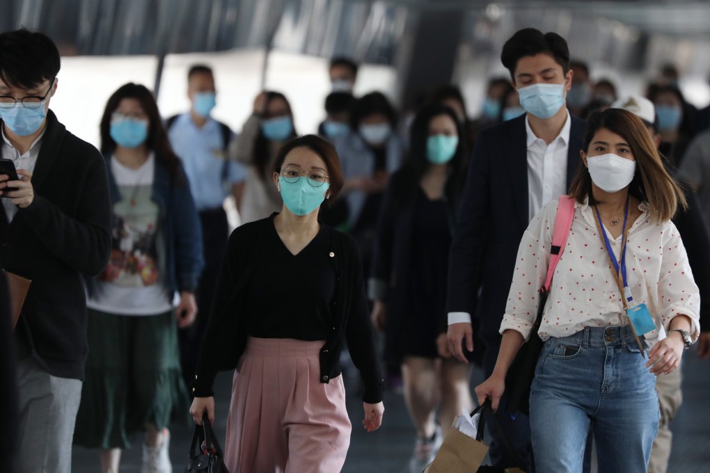 Workers head to their offices in Central during the coronavirus pandemic. Photo: Nora Tam