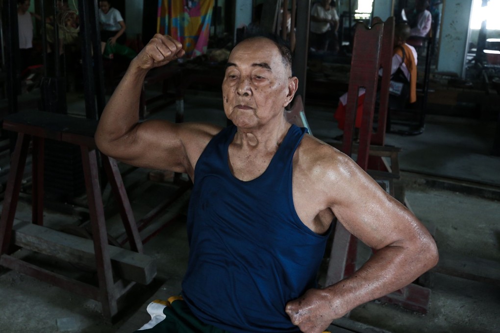 Sein Maung works out at his gym, which has been closed due to fears about the spread of the novel coronavirus. Photo: AFP
