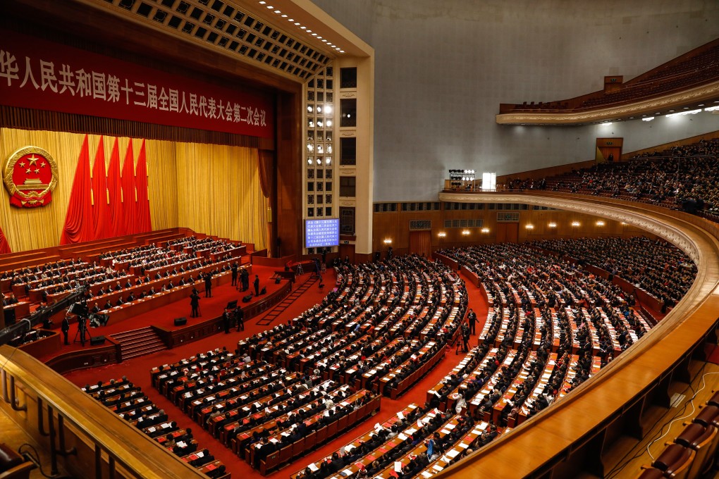Delegates attend the 13th National People’s Congress at the Great Hall of the People in Beijing last year. Photo: EPA-EFE