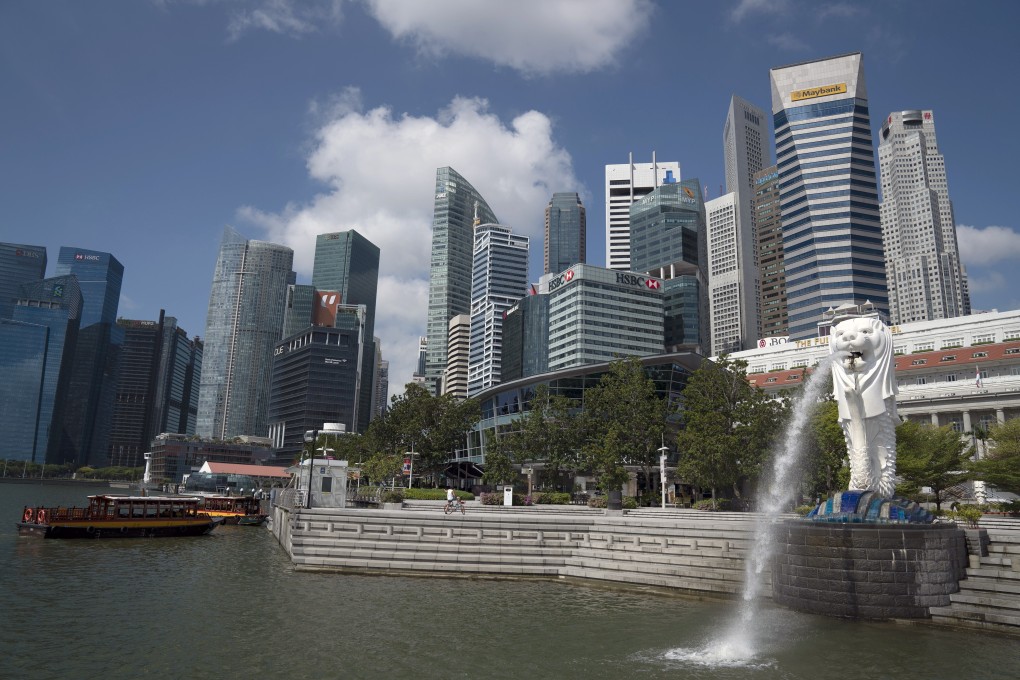 The Merlion Park waterfront stands empty in Singapore, as citizens and visitors stay away during the coronavirus circuit breaker measures, which are having a negative impact on economic activity in the city state. Photo: Bloomberg