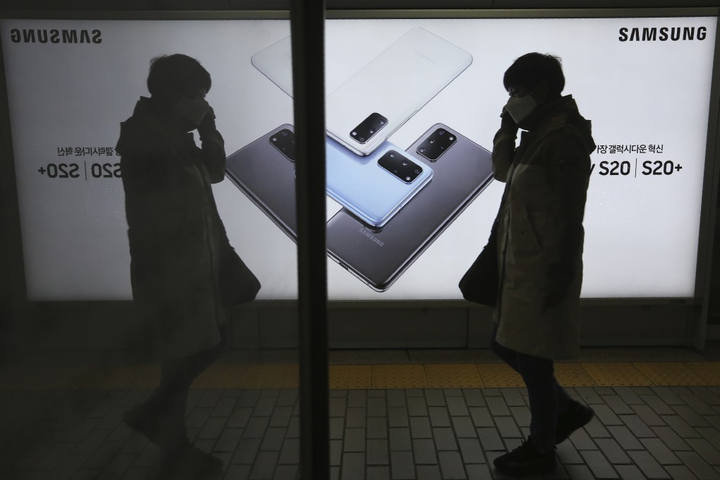 A man passes by an advertisement of Samsung Electronics' flagship Galaxy S20 and S20+ smartphones in Seoul, South Korea, on April 28. Photo: AP