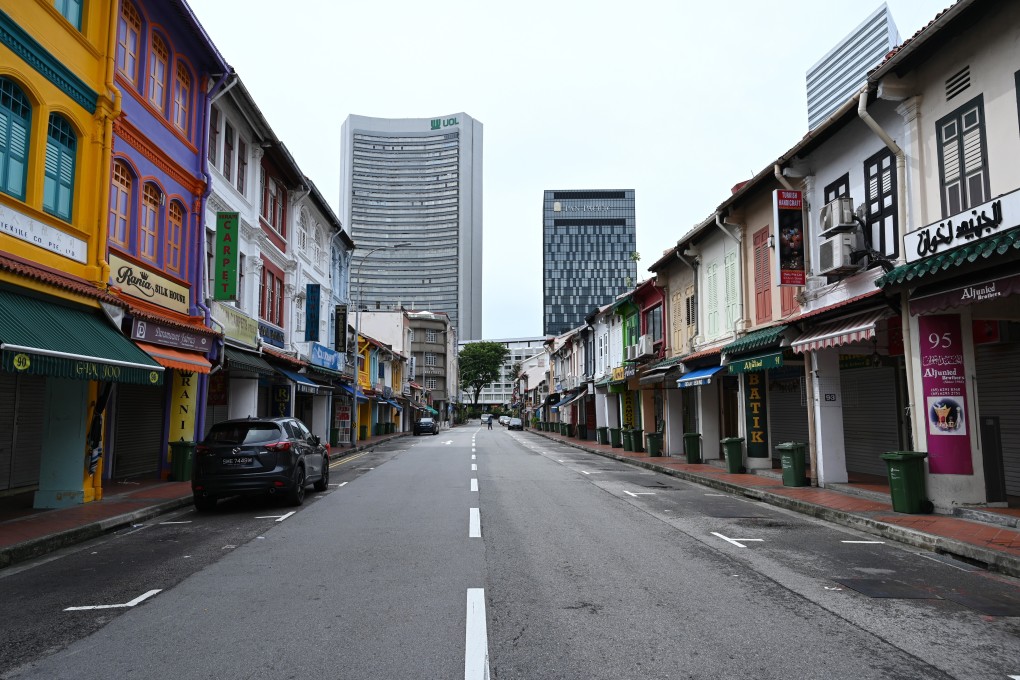 A street with shuttered shops in Singapore. Photo: AFP