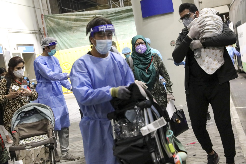 Hong Kong residents returning from Pakistan at airport. Photo: K.Y. Cheng