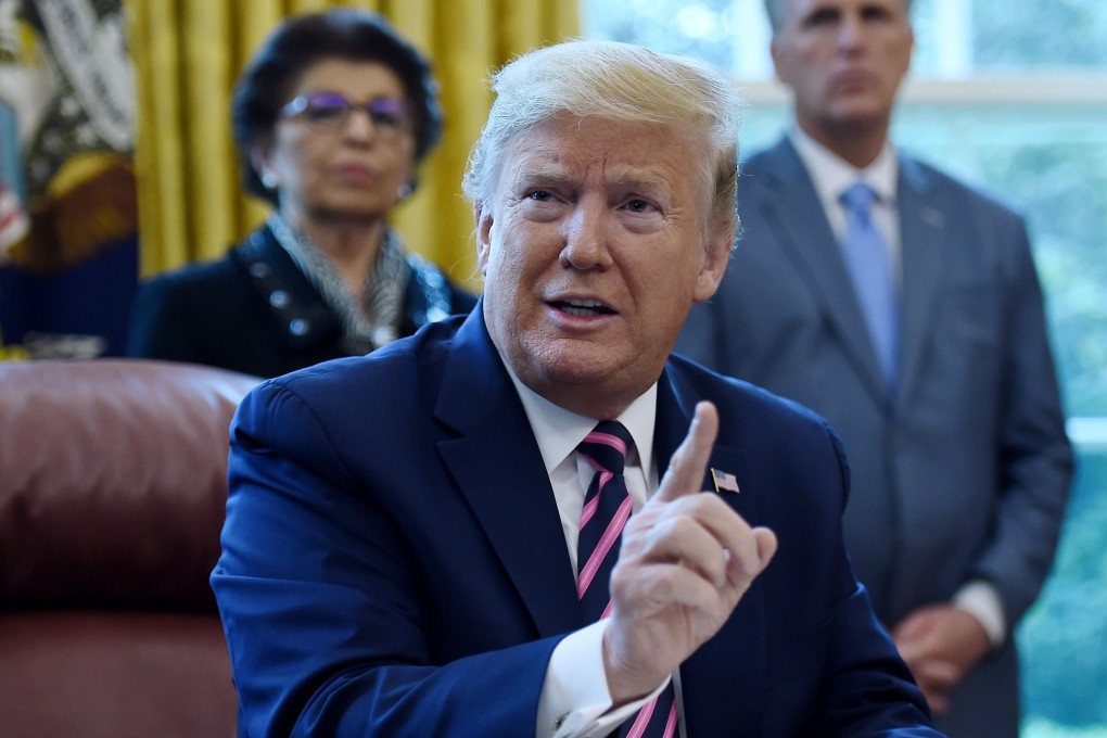 US President Donald Trump speaks in the Oval Office on April 24. Photo: AFP