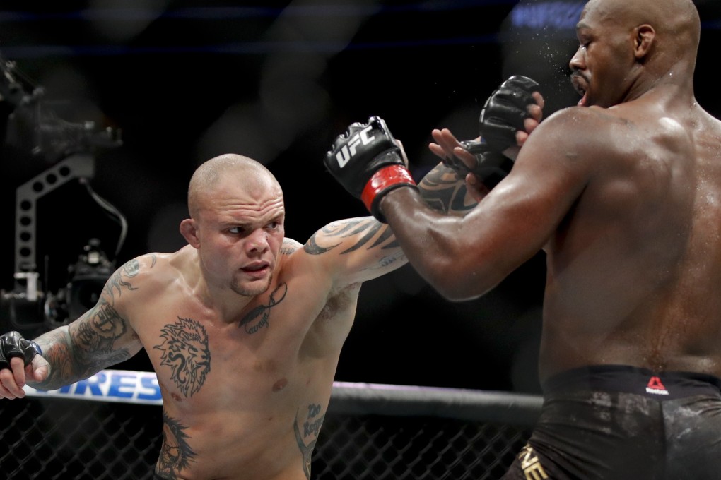 Anthony Smith throws a punch at Jon Jones in their light heavyweight title bout at UFC 235. Photo: AP