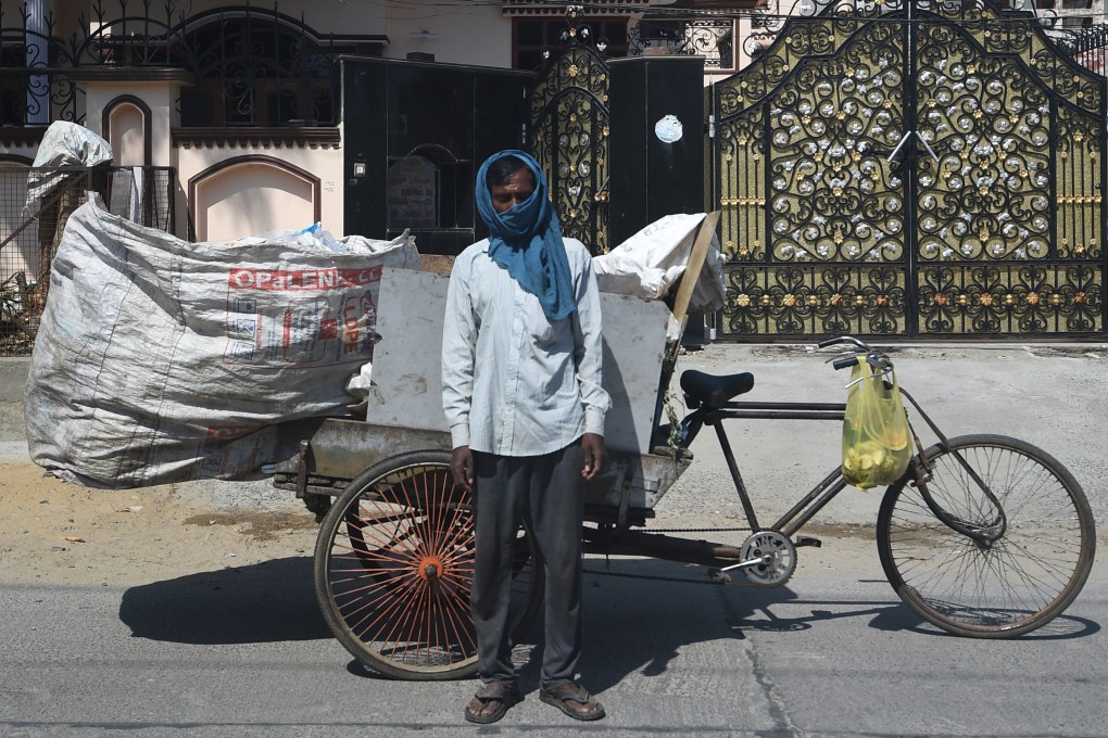 A waste collector in Faridabad, India, on April 22, 2020. Photo: AFP