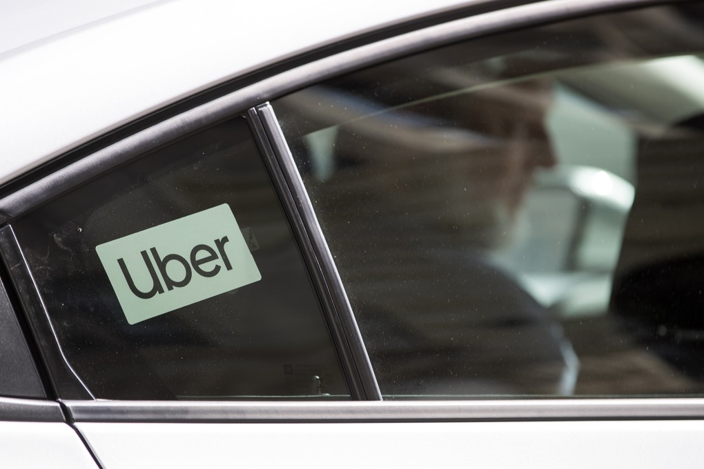 A driver of ride-hailing giant Uber Technologies waits for a passenger in Washington, DC, in August of last year. Photo: EPA-EFE