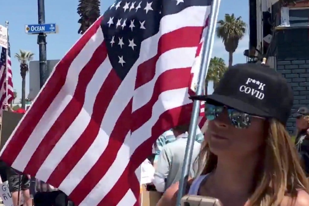 US protesters rally in San Diego, California, calling for an end to the coronavirus lockdown. Photo: Reuters