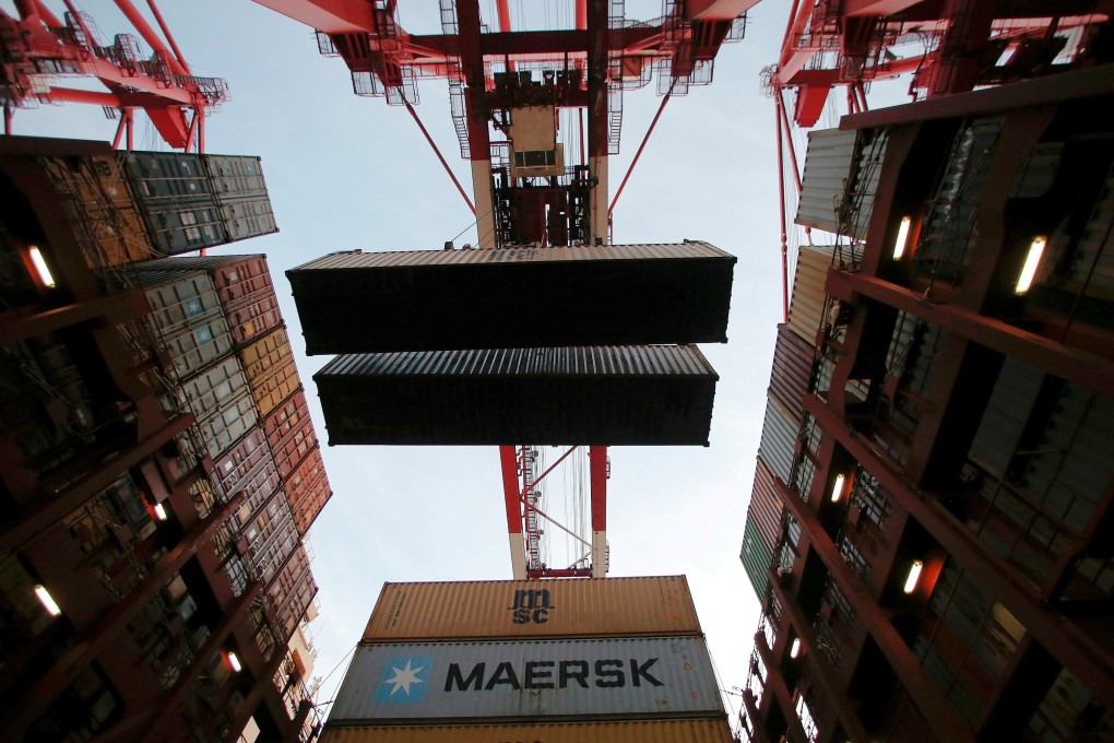 Containers are unloaded from a container ship at the Yangshan Deep Water Port in Shanghai, China, before the coronavirus pandemic brought things to a halt. Photo: Reuters