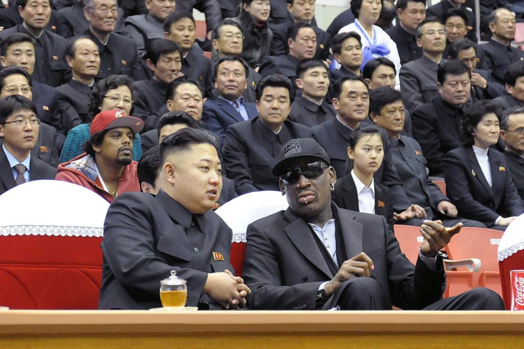North Korean leader Kim Jong-Un and former NBA star Dennis Rodman watch a basketball game together in Pyongyang in February, 2013. Photo: AFP