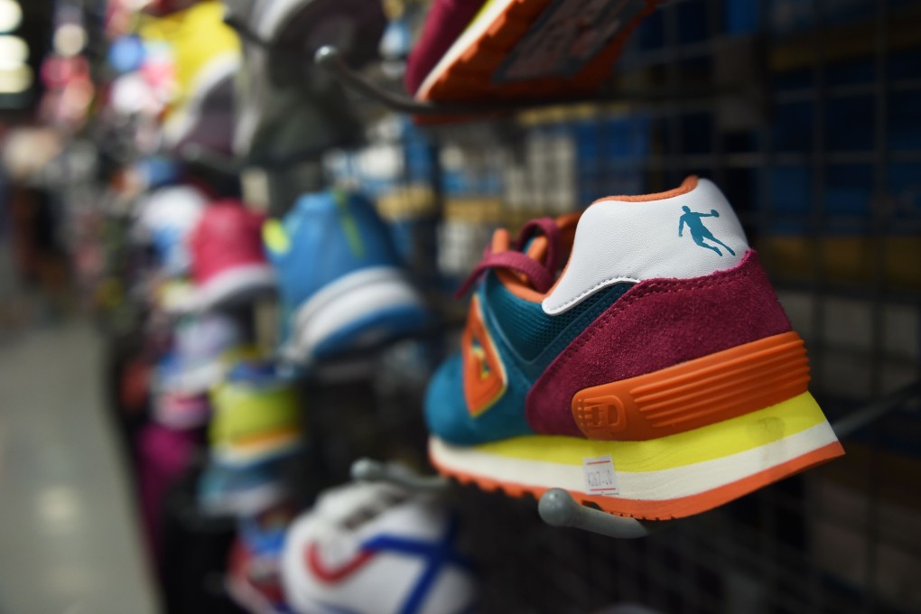 A Qiaodan brand shoe is seen in a Beijing store. China’s top court ruled that the firm had illegally used Michael Jordan’s Chinese name – Qiao Dan. Photo: AFP