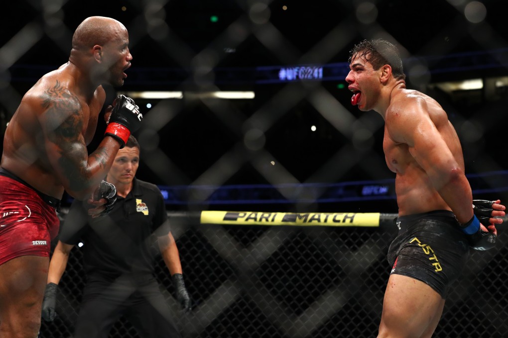 Paulo Costa taunts Yoel Romero in the third round of their middleweight bout at UFC 241. Photo: AFP