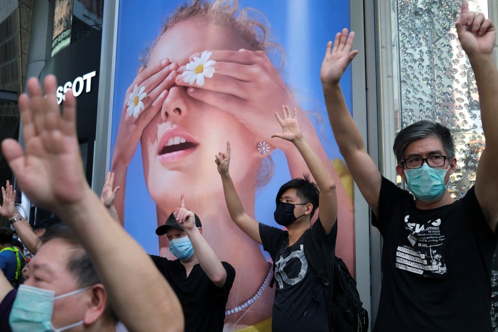 Anti-government protesters wearing face masks to avoid the spread of the coronavirus in Hong Kong on May 1, 2020. Photo: Reuters